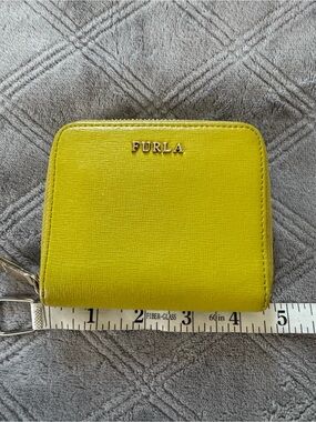 Furla fold Yellow round zip wallet